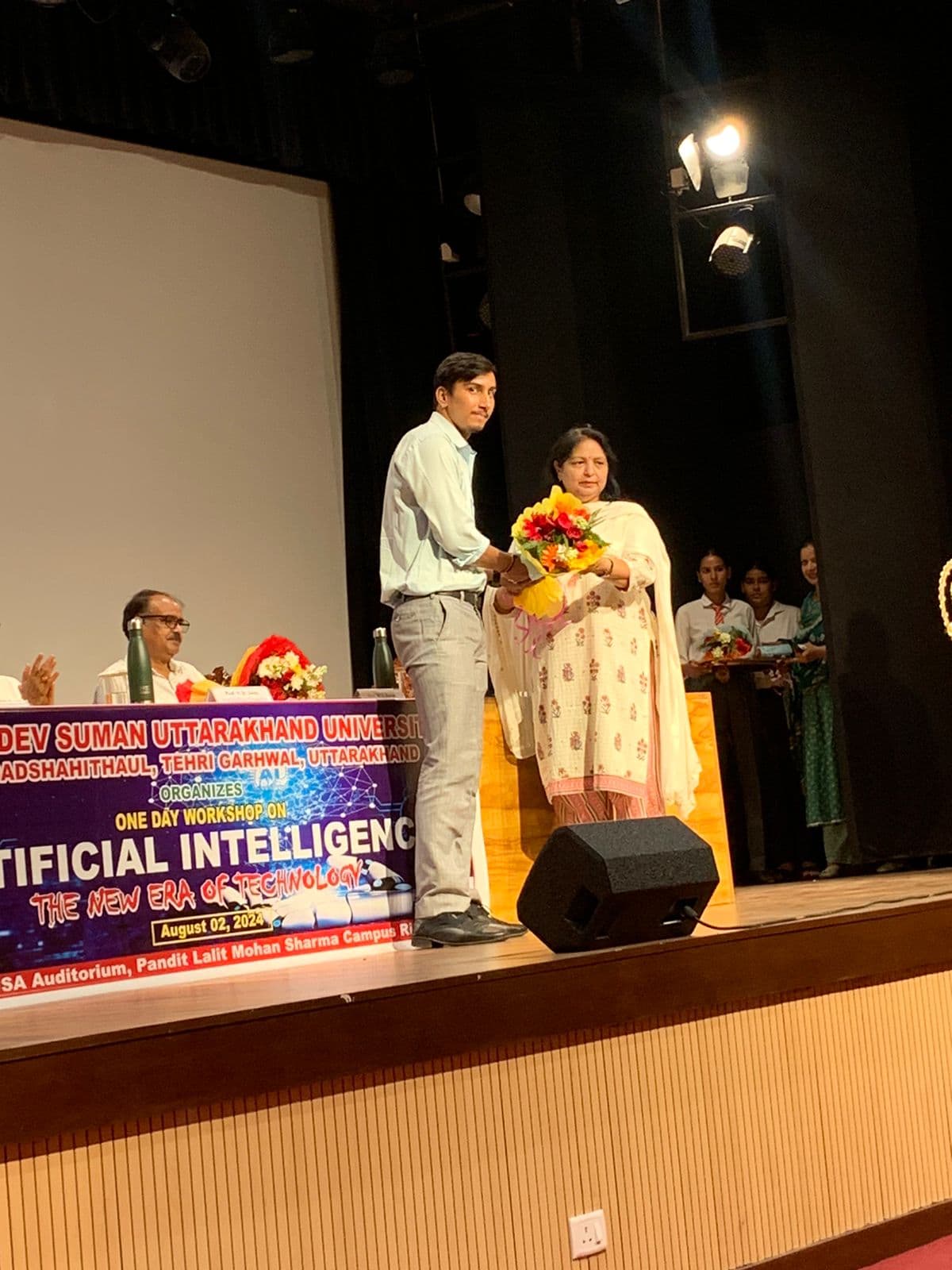 Felicitation ceremony on stage