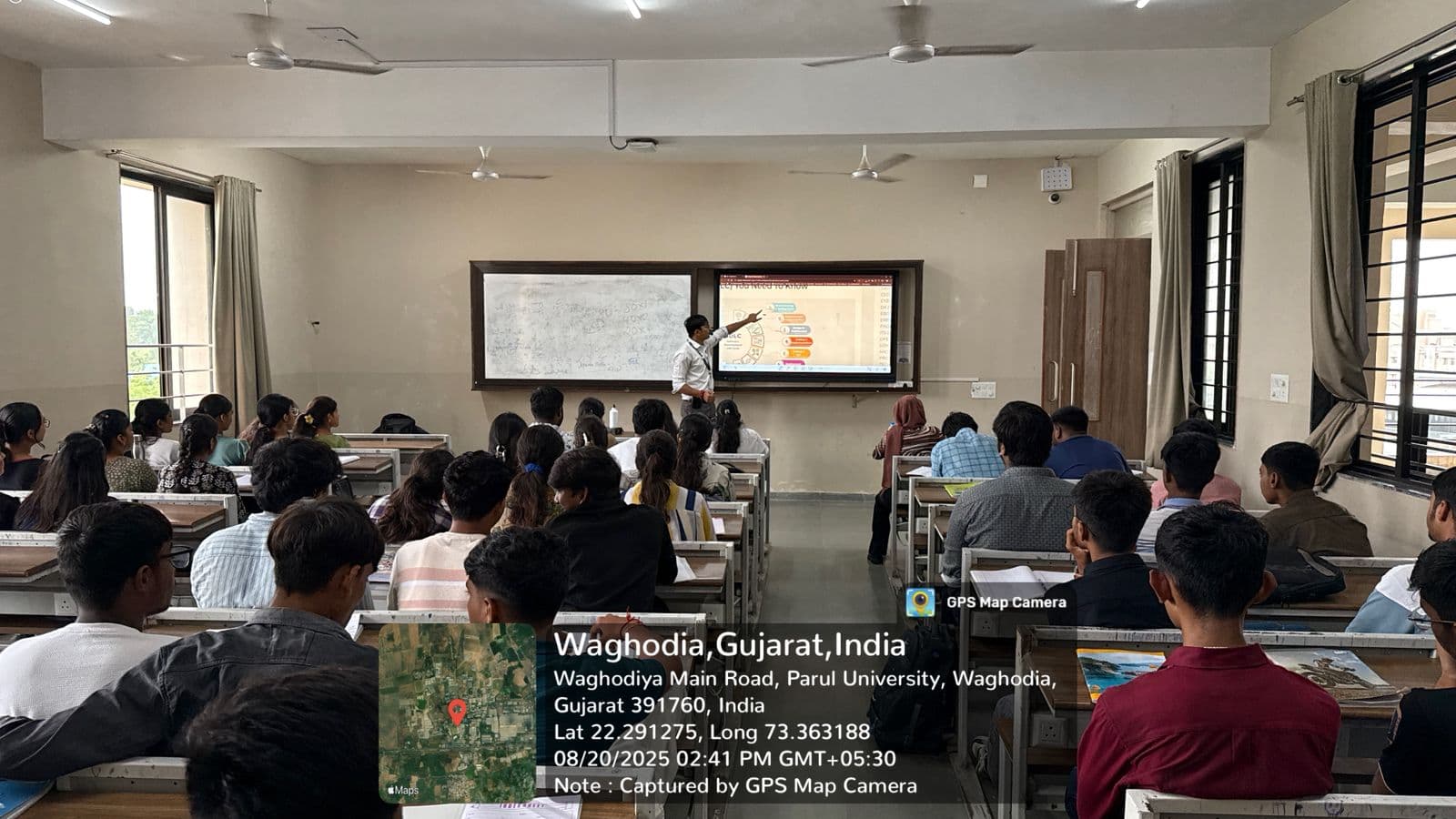 Classroom teaching session with large audience